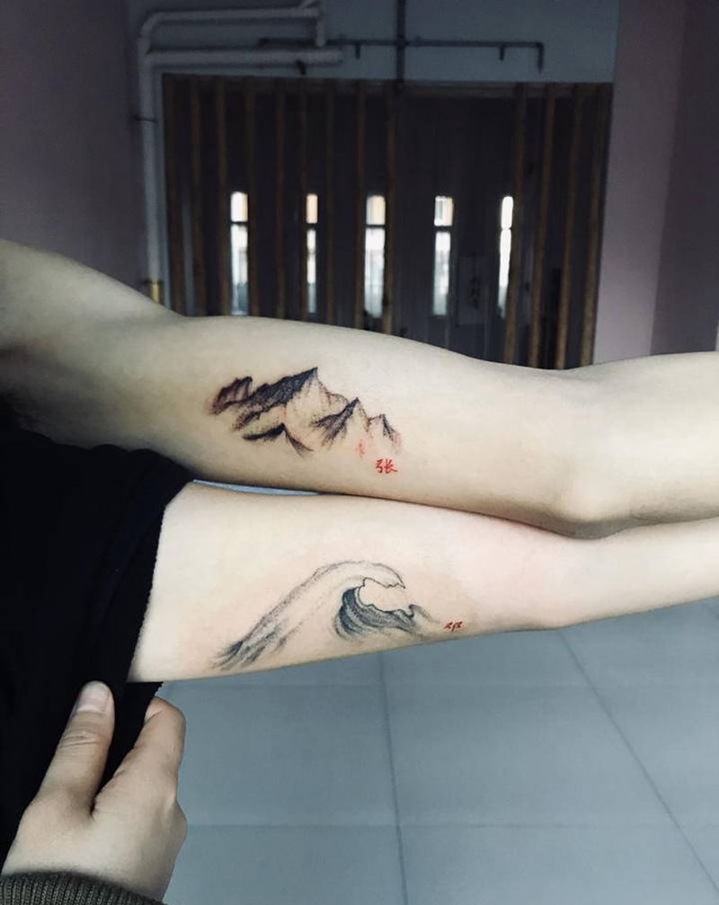 山海纹身图片_手臂点刺纹身图案