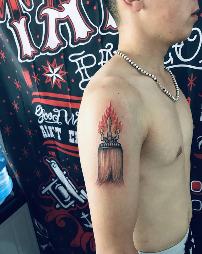 白色苏鲁锭纹身图片_手臂欧美写实新传统纹身图案