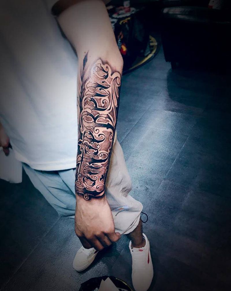 花体纹身图片_手臂花体字纹身图案