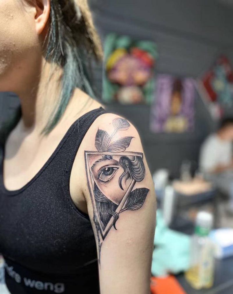 眼睛纹身图片_手臂欧美写实纹身图案