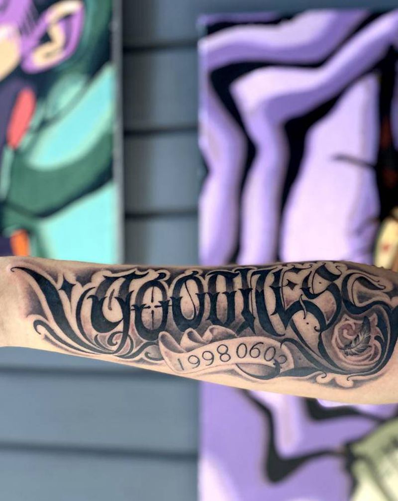 花体字纹身图片_手臂花体字纹身图案