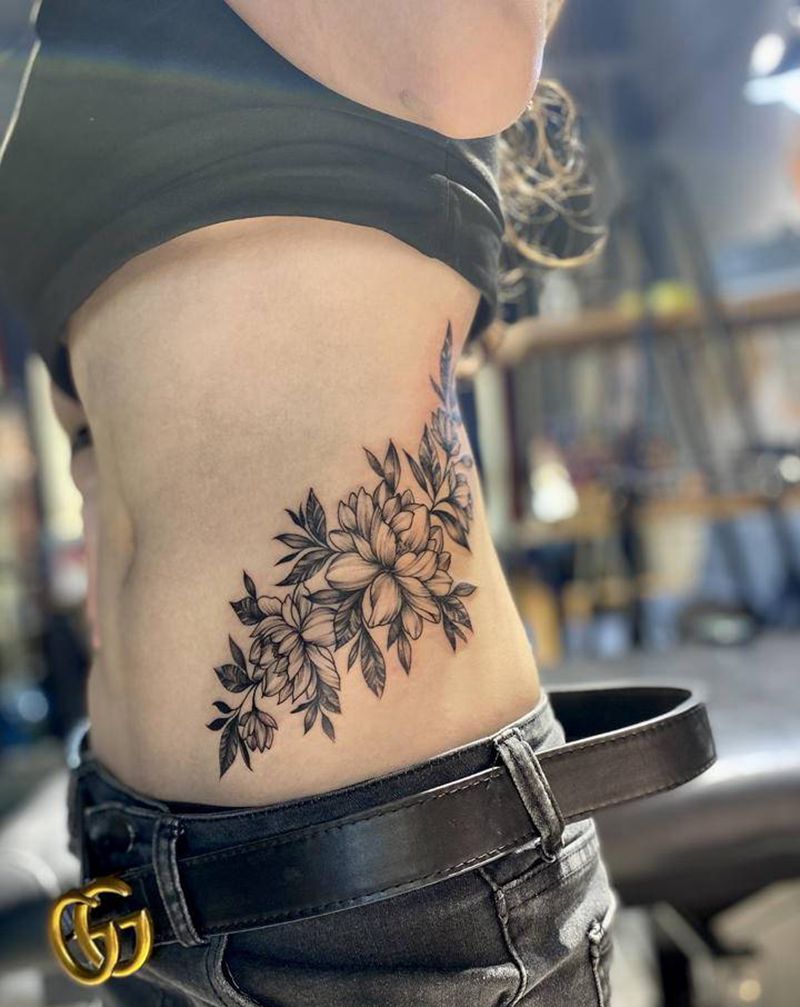 素花纹身图片_腰部点刺纹身图案