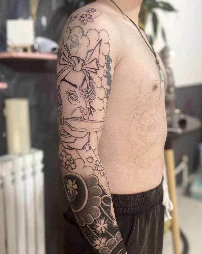 未完纹身图片_手臂老传统纹身图案