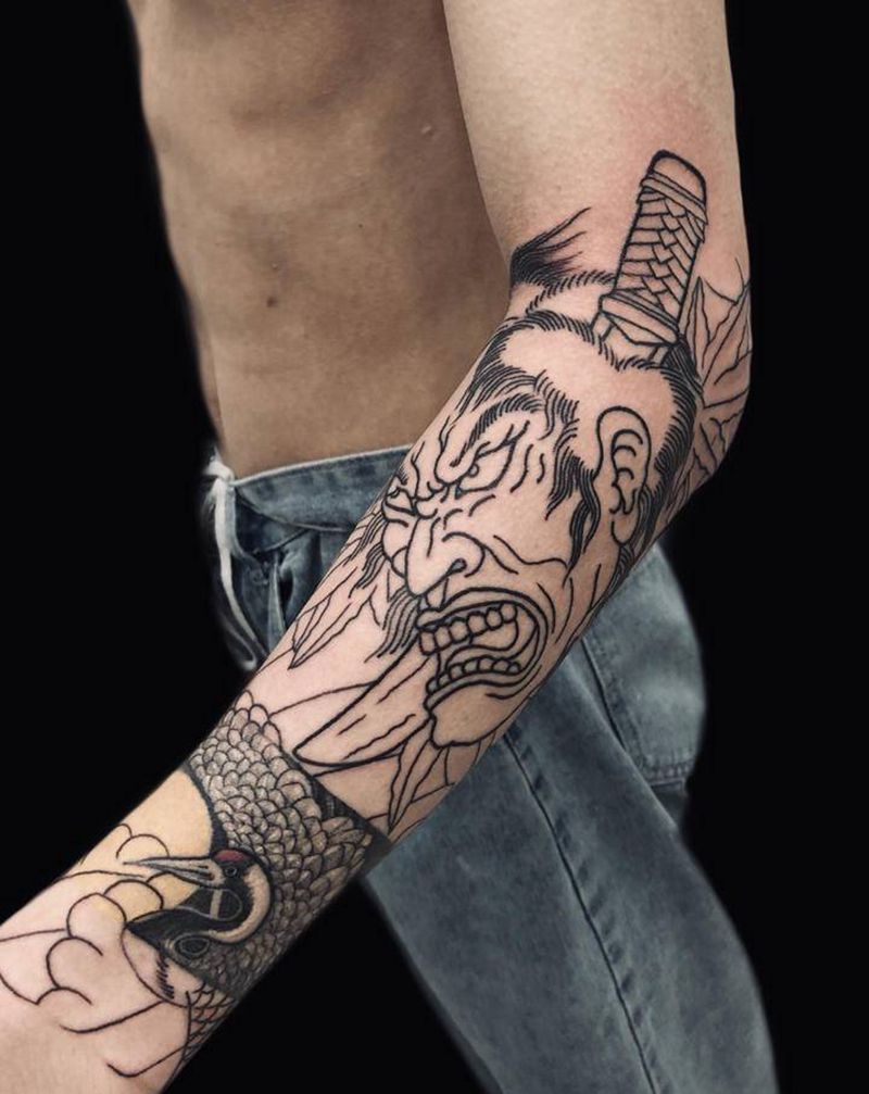 生首纹身图片_手臂老传统纹身图案