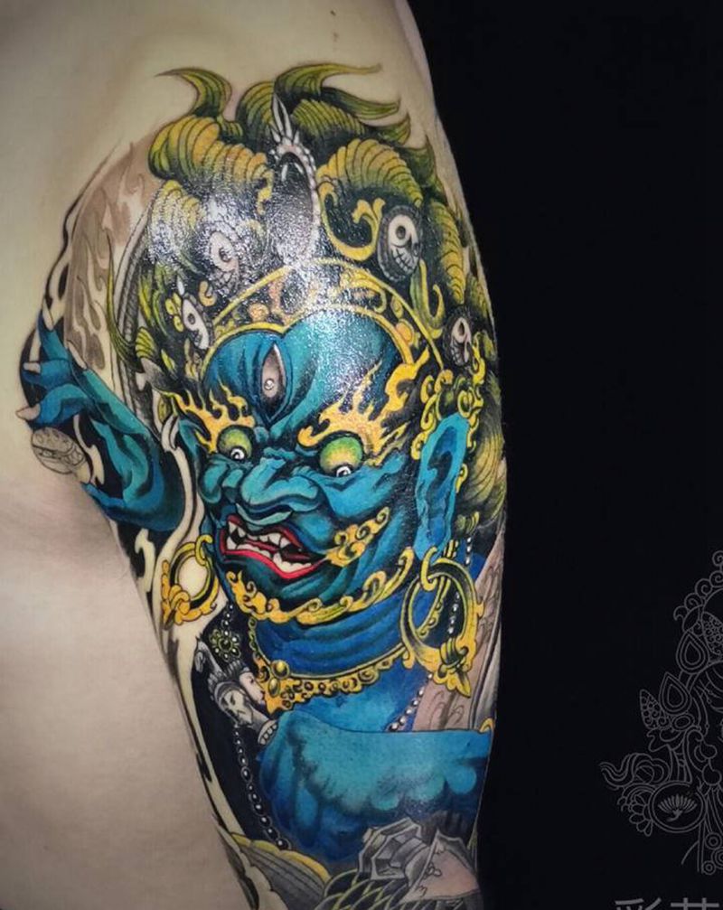 彩色大黑天纹身图片_手臂新传统纹身图案