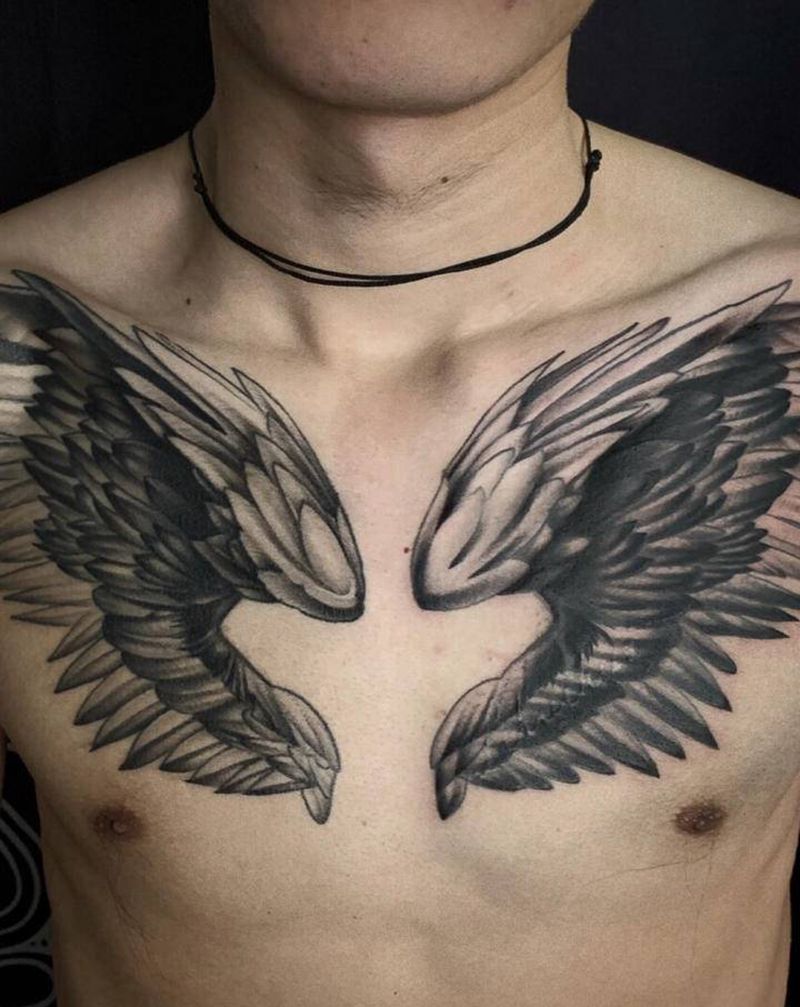 店内前胸遮盖作品纹身图片_胸部图腾点刺纹身图案