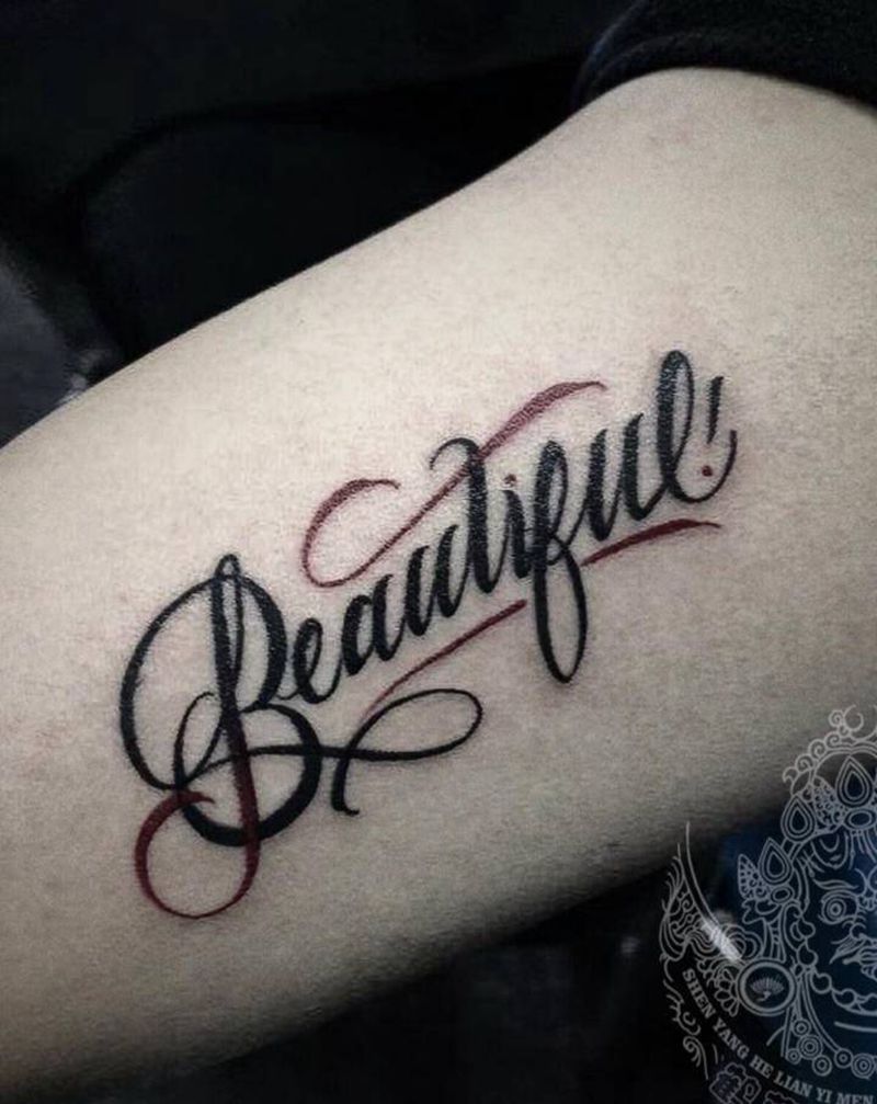 小花体英文纹身图片_手臂花体字纹身图案