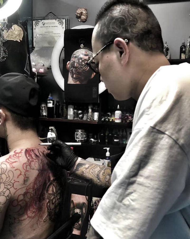 工作照纹身图片_背部老传统纹身图案