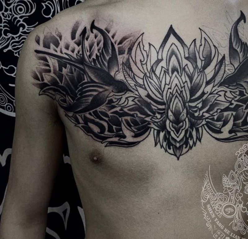 花胸未完纹身图片_胸部点刺纹身图案