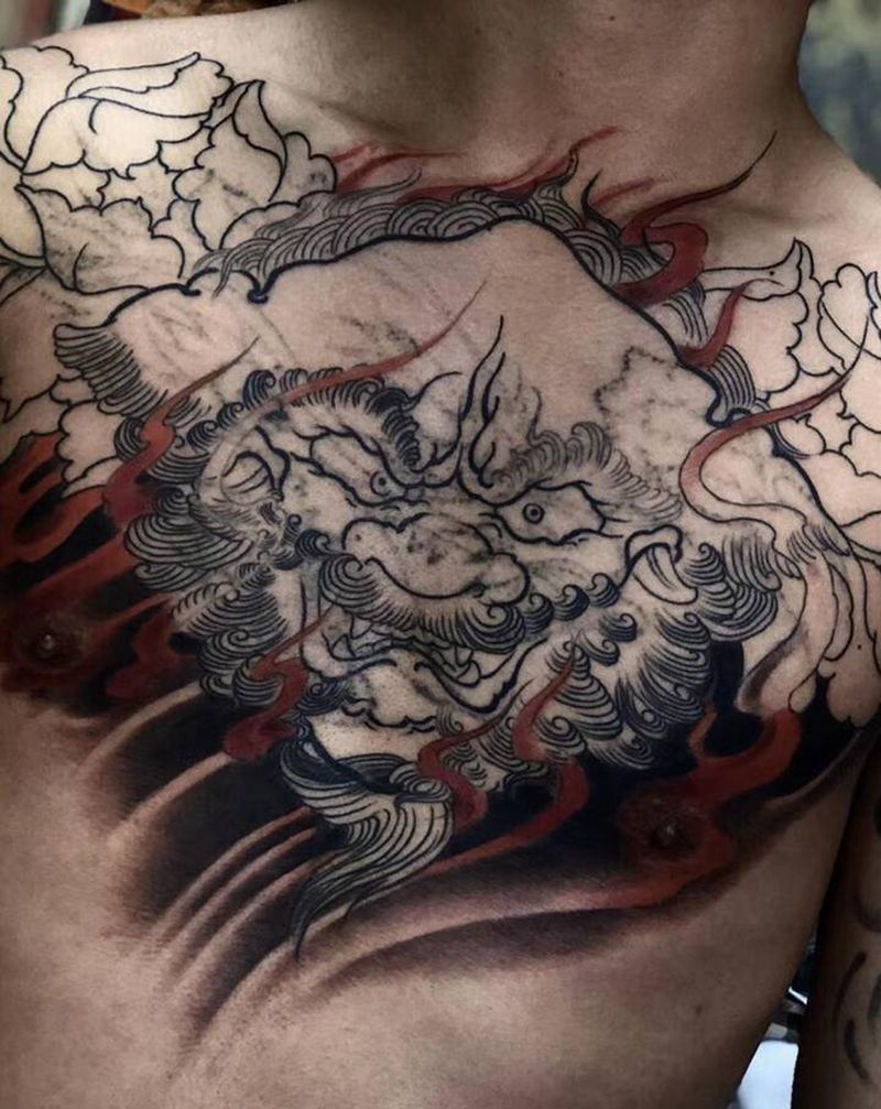 花胸未完纹身图片_胸部新传统纹身图案