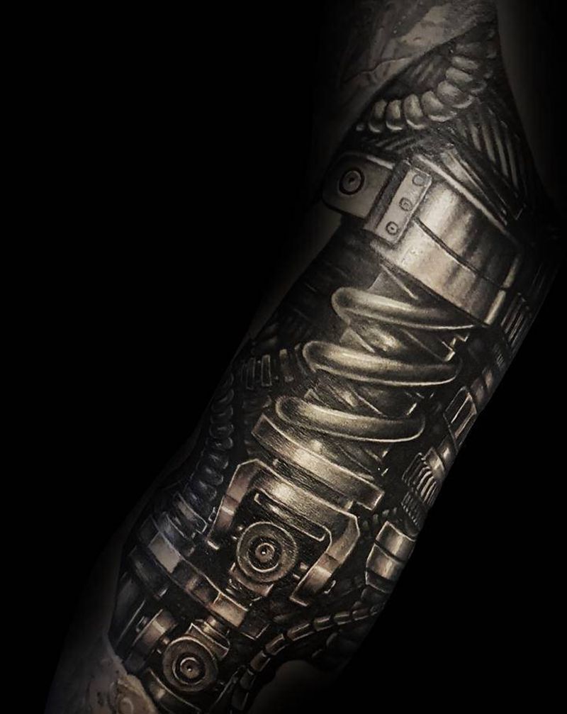 雕龙臂纹身图片_手臂肩部欧美写实机械石雕同城纹身图案