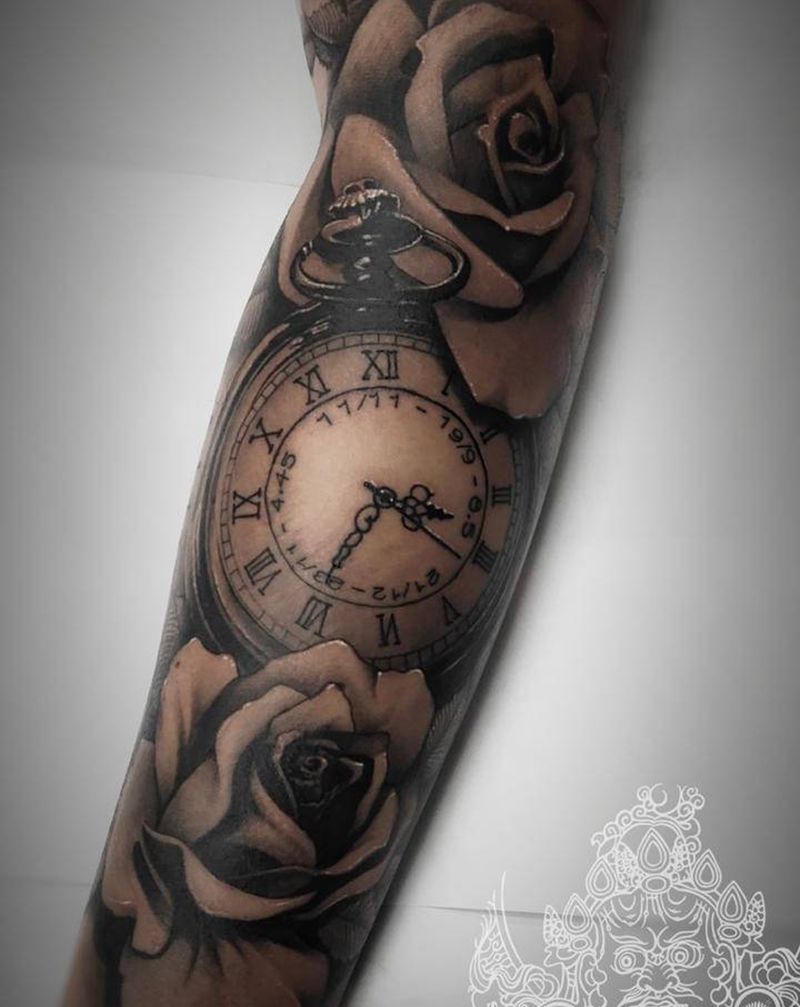 钟表玫瑰未完纹身图片_手臂欧美写实纹身图案