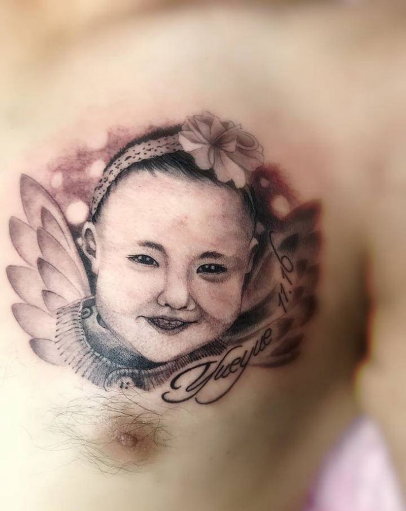 父爱如山纹身图片_胸部纹身图案