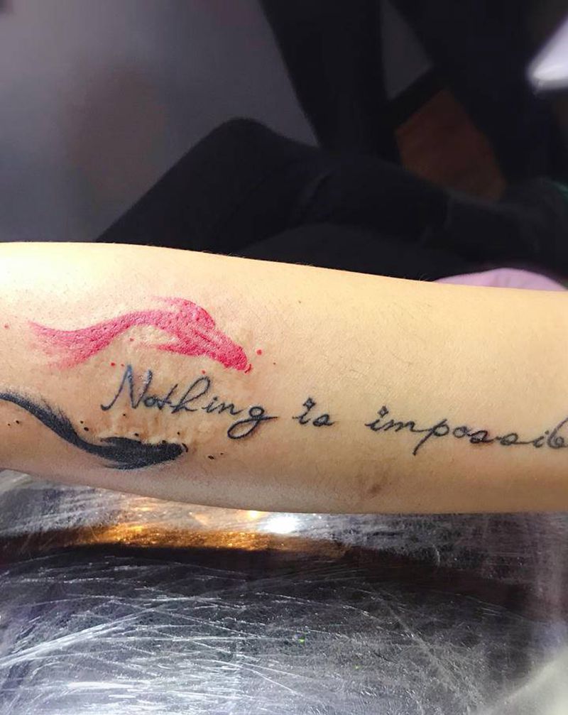 鱼纹身图片_手臂纹身图案