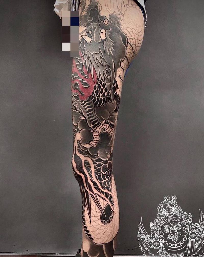 店内花腿进度纹身图片_腿部老传统纹身图案