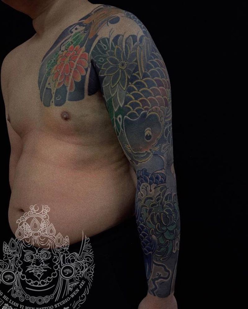 店内花臂纹身图片_手臂老传统纹身图案