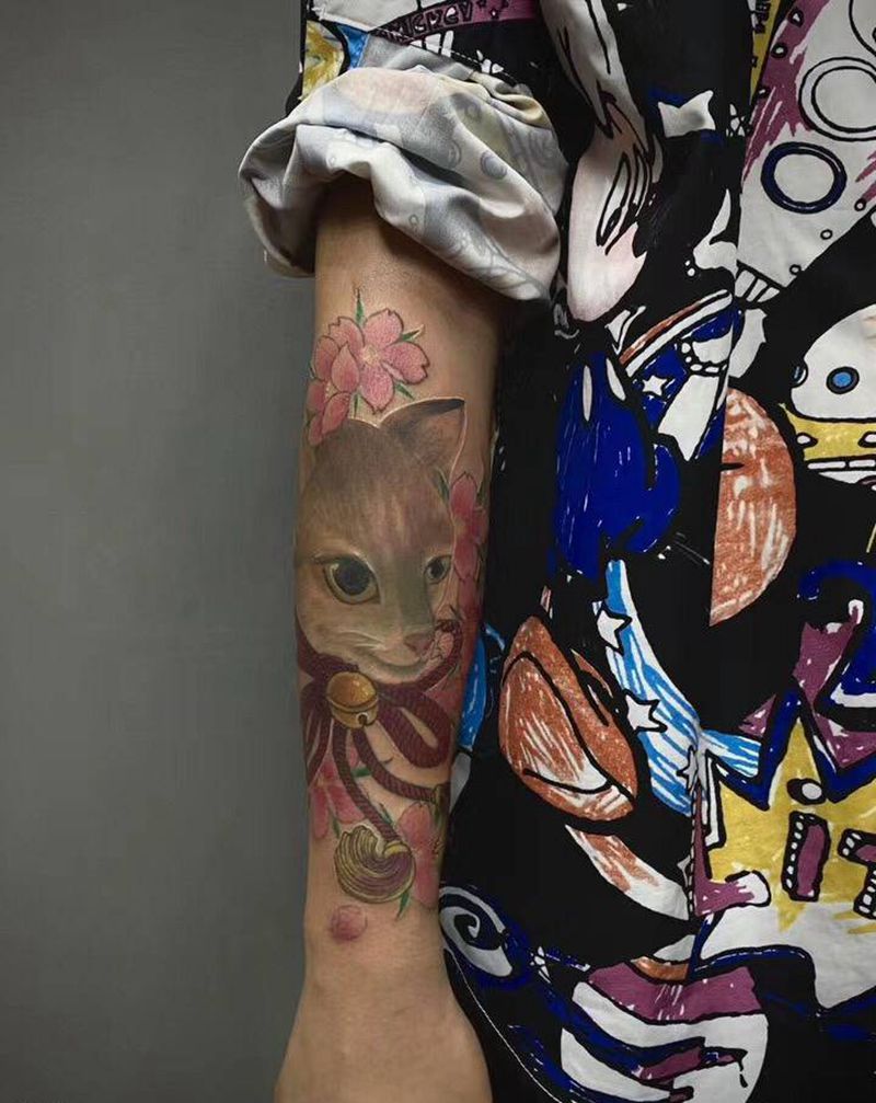 爱宠纹身图片_手臂欧美写实纹身图案