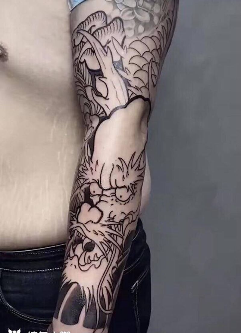 未完纹身图片_手臂新传统纹身图案