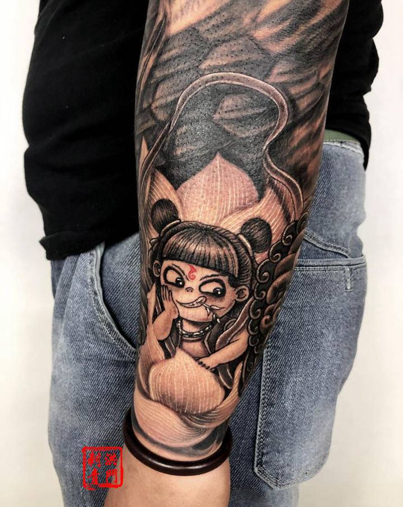 大圣/哪吒纹身图片_手臂肩部新传统欧美写实斗战胜佛哪吒龙纹身图案