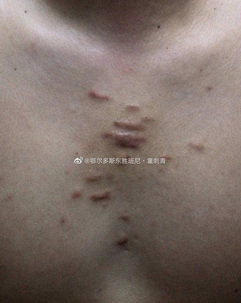 遮盖纹身图片_胸部纹身图案