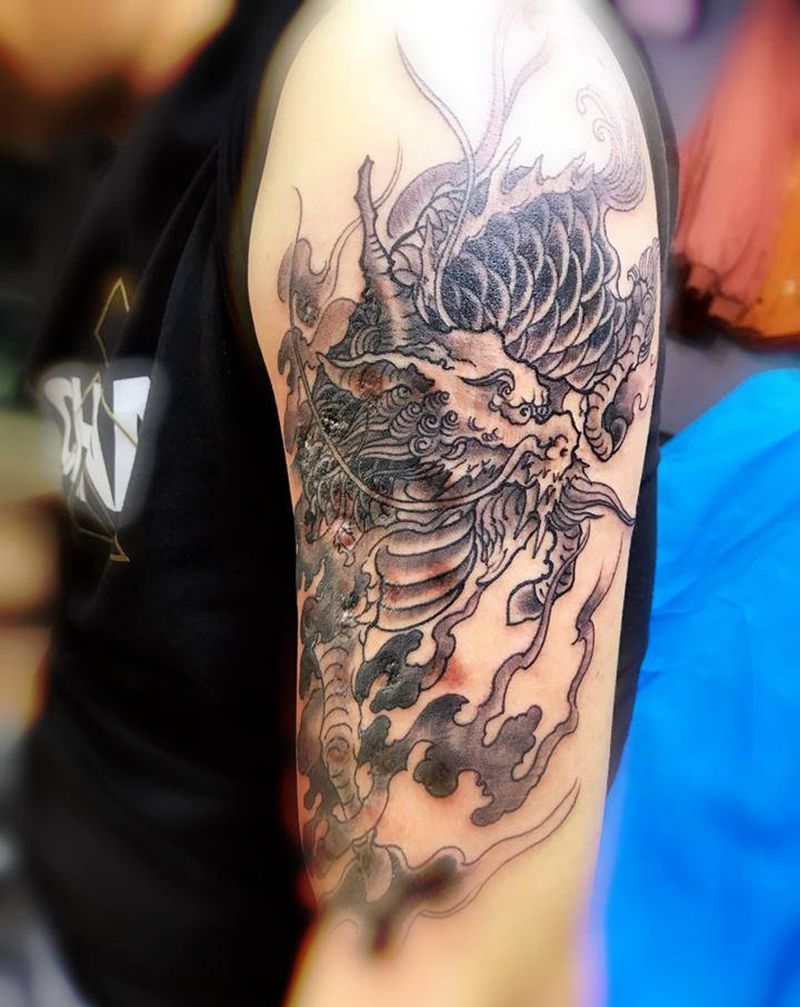 麒麟 疤痕遮盖纹身图片_手臂纹身图案