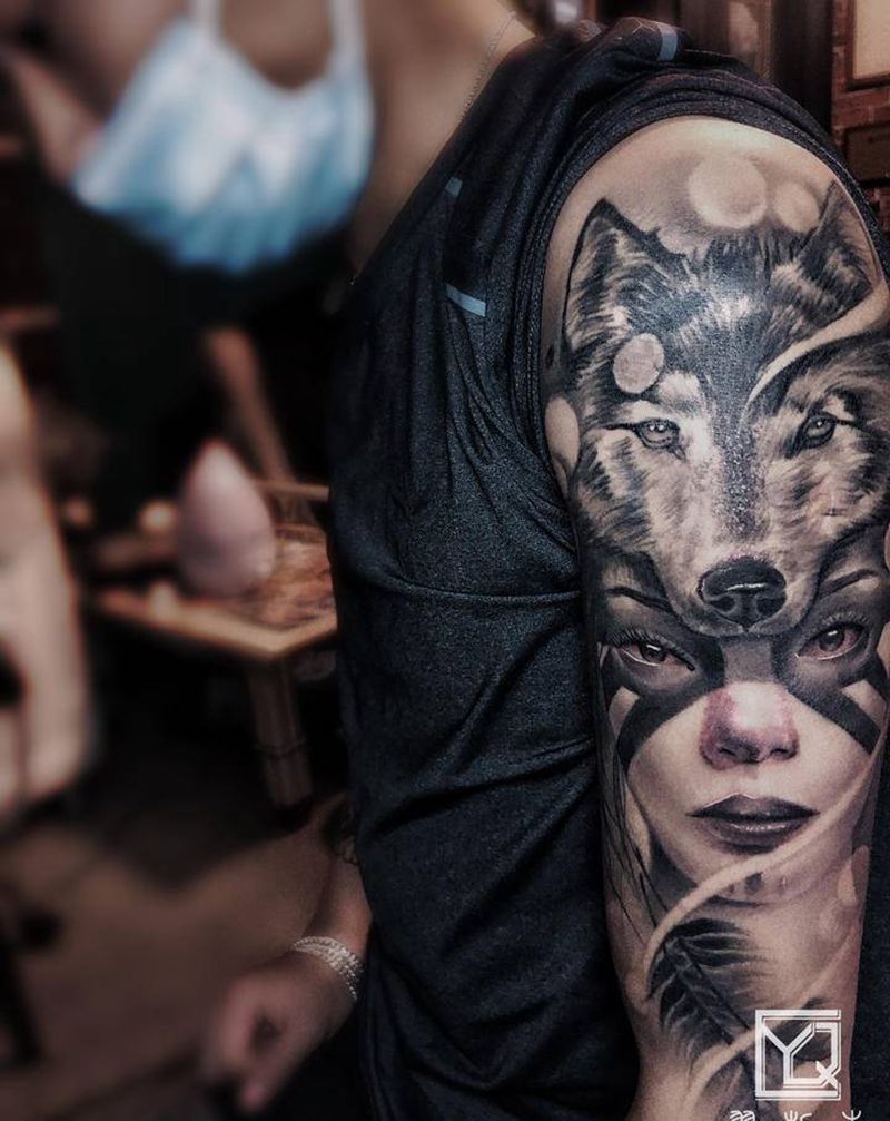 欧美写实纹身图片_手臂欧美写实欧美写实狼美女纹身图案