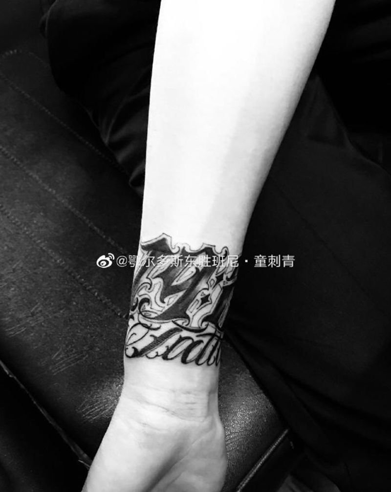 花体字纹身图片_手臂纹身图案