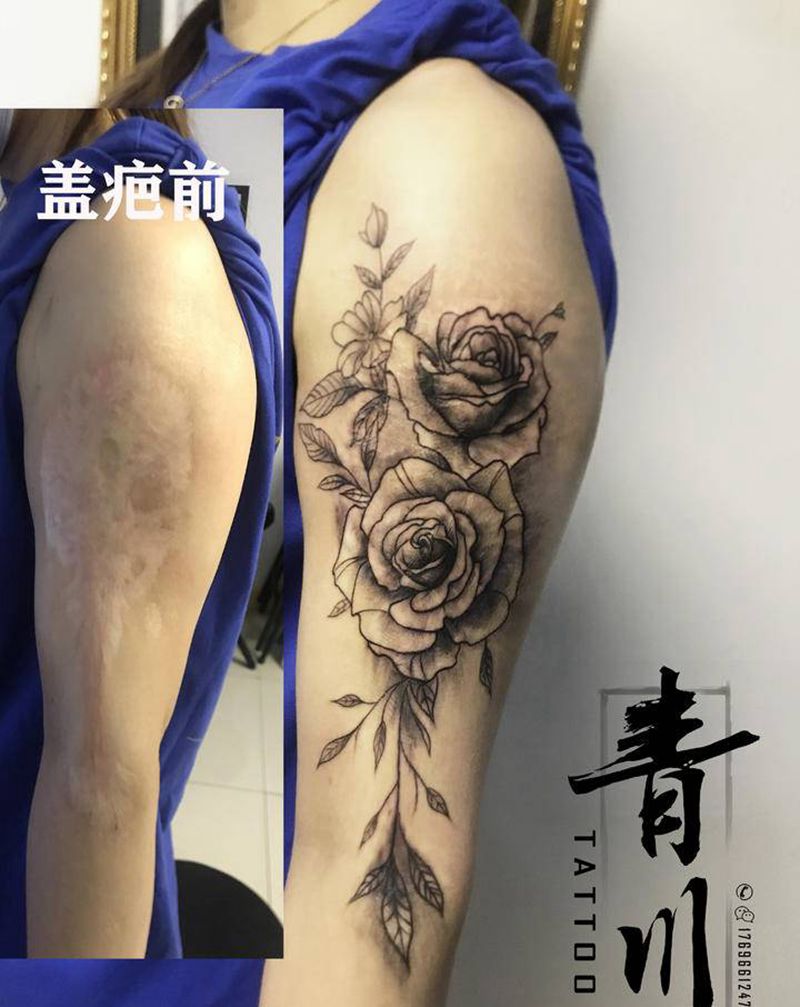 遮盖烫伤疤纹身图片_手臂欧美写实水墨纹身图案