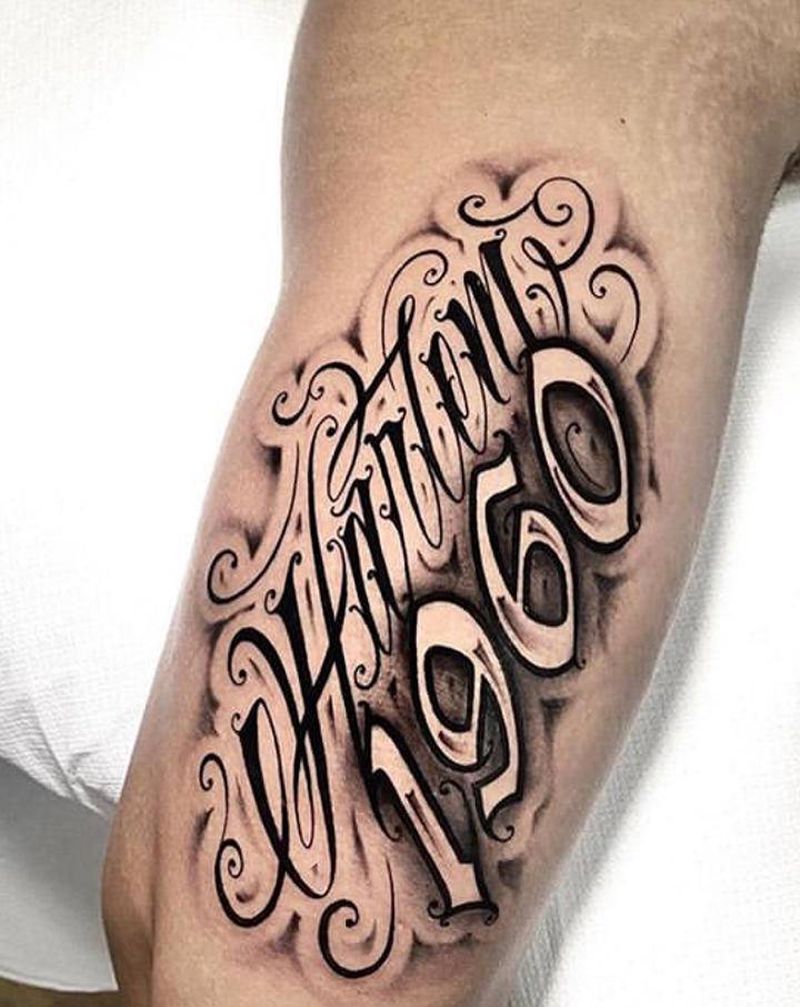 花体字纹身图片_手臂花体字纹身图案
