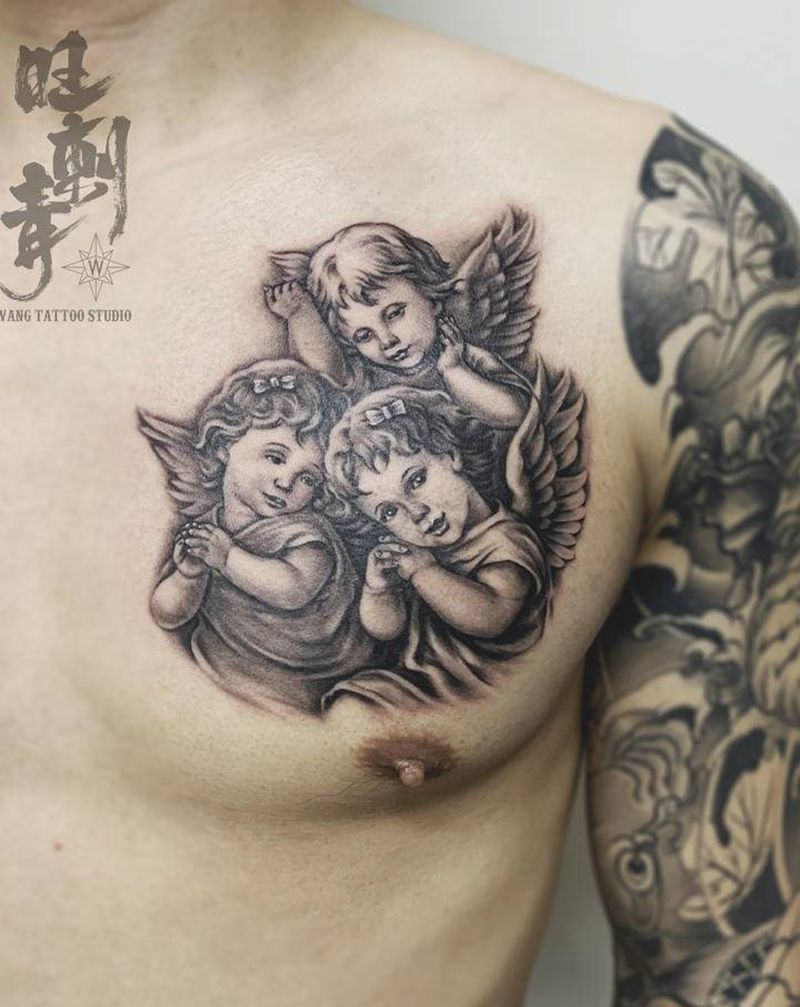 天使宝贝纹身图片_胸部欧美写实天使纹身图案