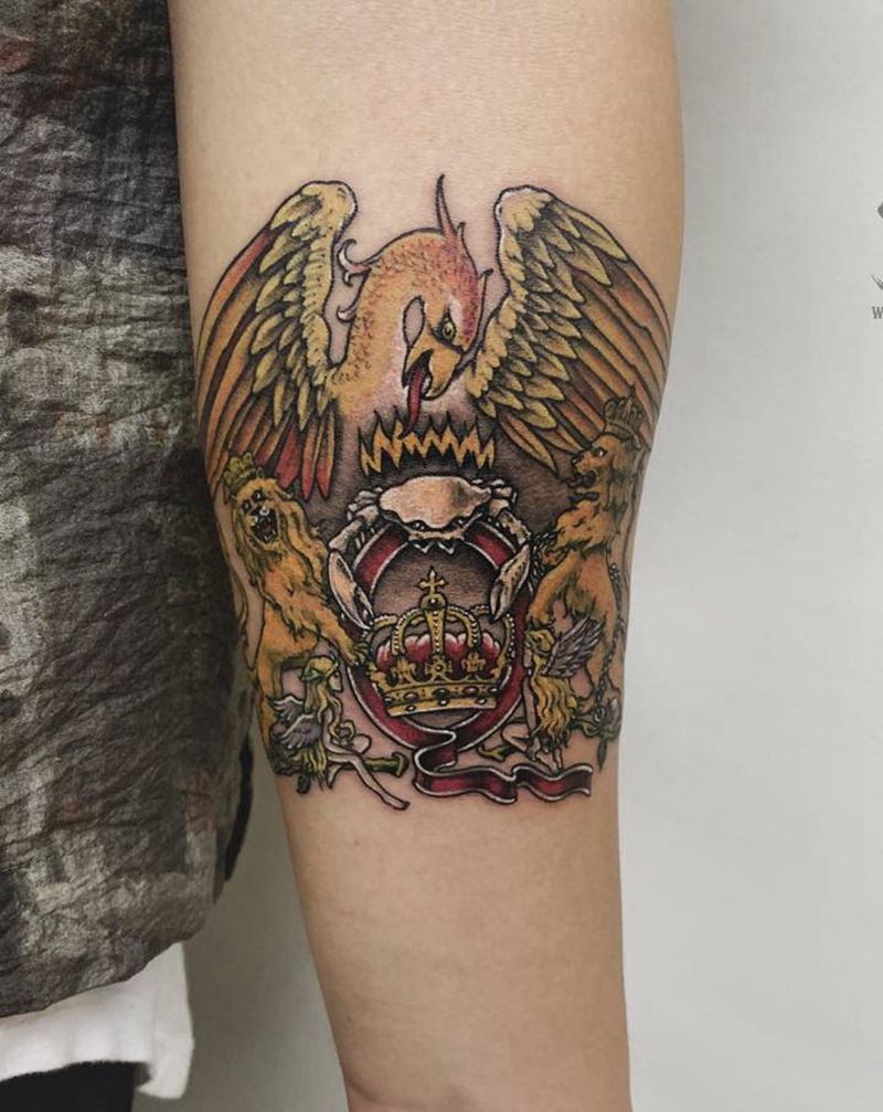 皇后乐队logo纹身图片_手臂欧美写实图腾皇后乐队logo纹身图案