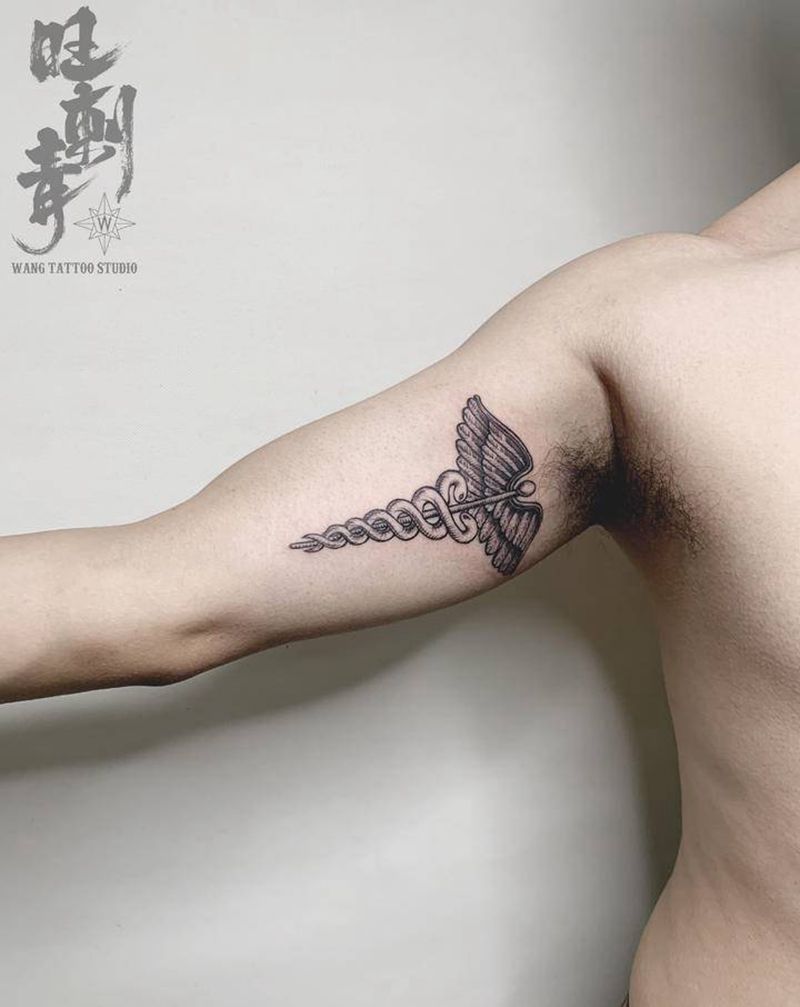 赫尔墨斯权杖纹身图片_手臂欧美写实权杖纹身图案