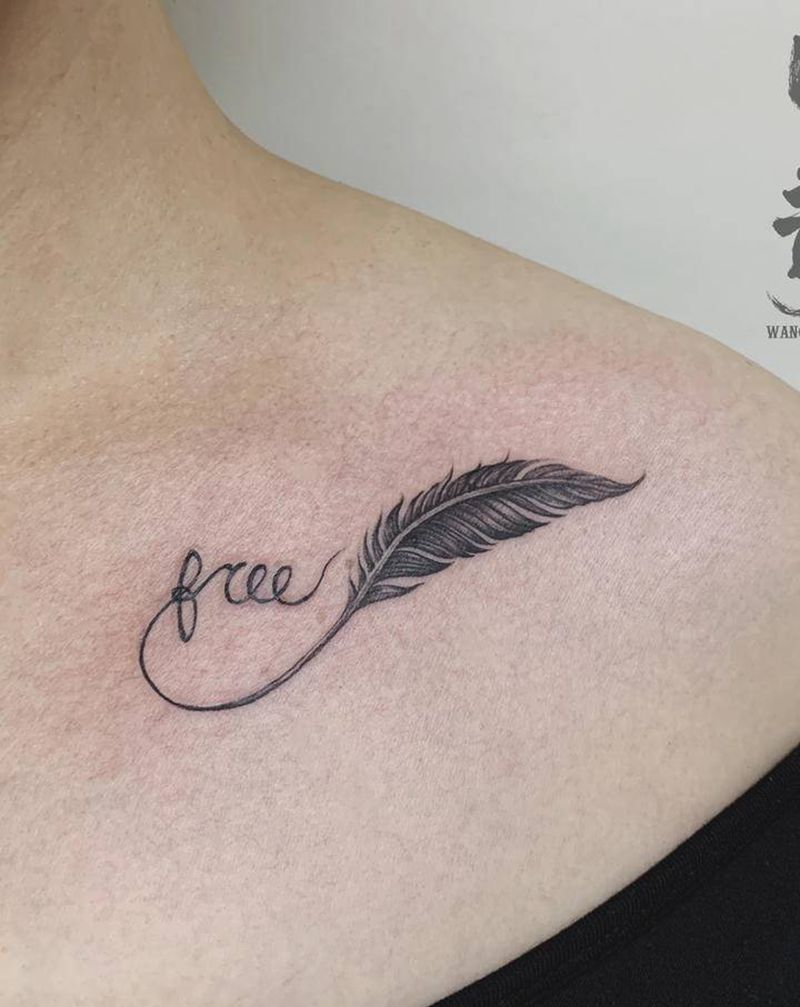 锁骨羽毛纹身图片_颈部肩部欧美写实羽毛纹身图案