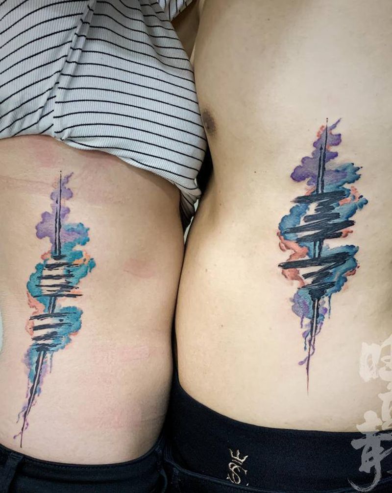 一对儿哑铃儿纹身图片_腹部腰部水彩水墨哑铃纹身图案