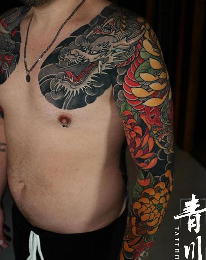 老传统花臂龙纹身图片_手臂老传统新传统龙纹身图案