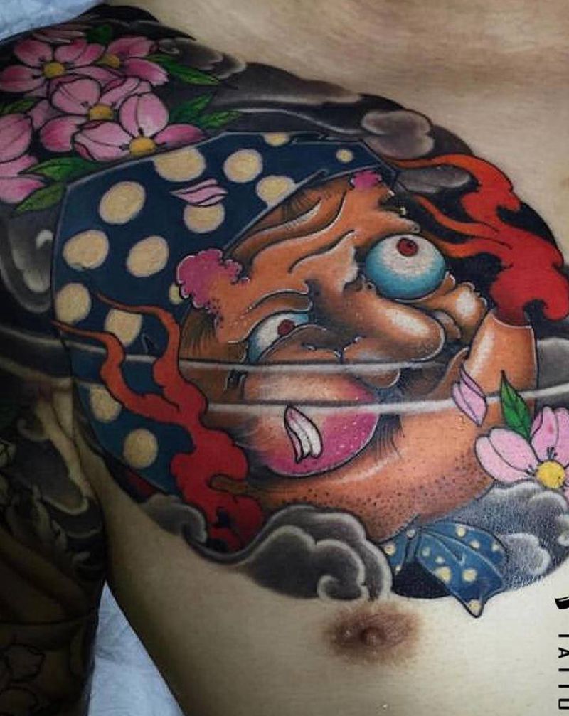 火男阿多福纹身图片_胸部老传统新传统纹身图案