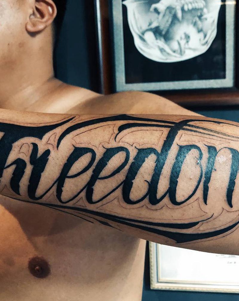 手臂花体字.纹身图片_手臂花体字纹身图案