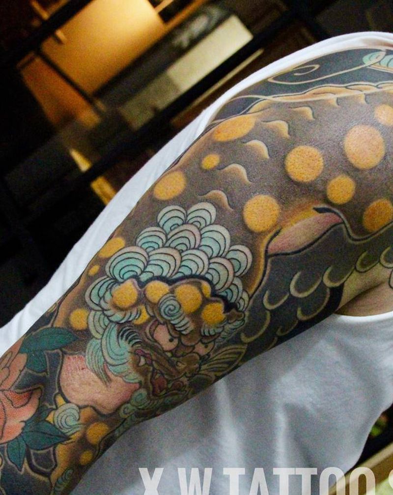 唐狮花臂纹身图片_老传统小伟刺青2号店作品纹身图案