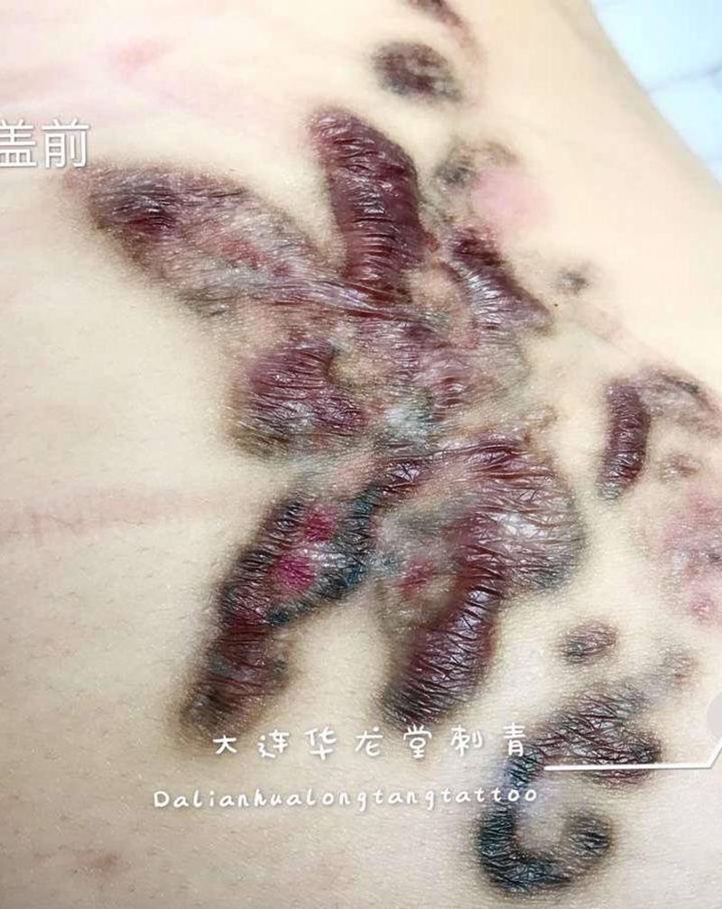 大连华龙堂刺青纹身图片_臀部腿部修改 遮盖纹身图案