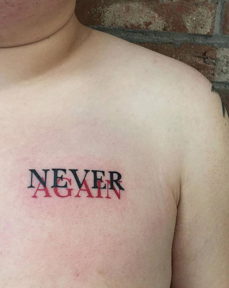 《个性英文》纹身图片_胸部花体字纹身图案