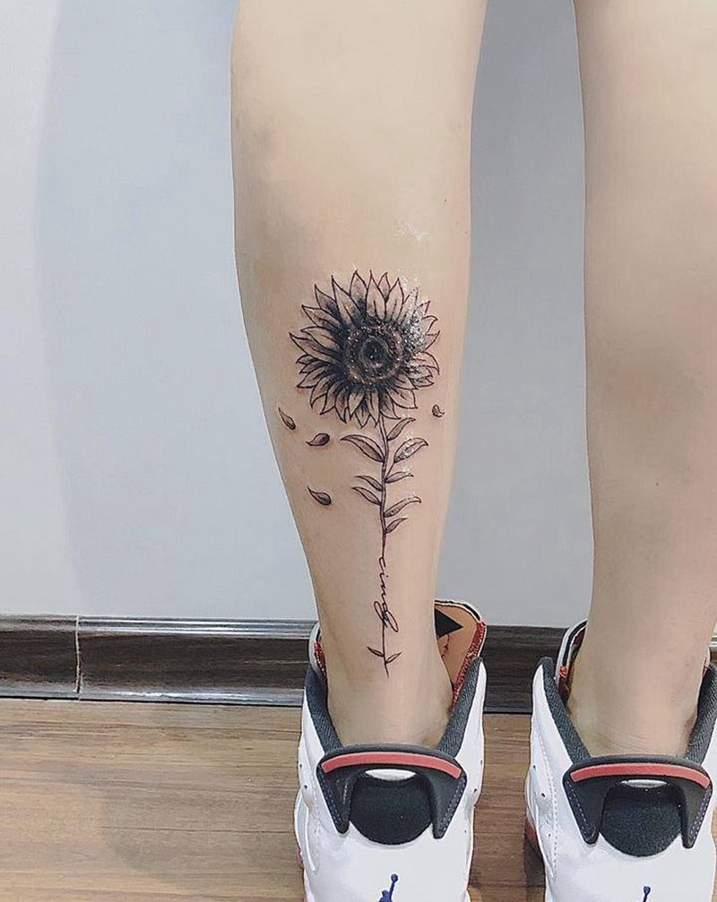 《花》纹身图片_腿部水墨纹身图案