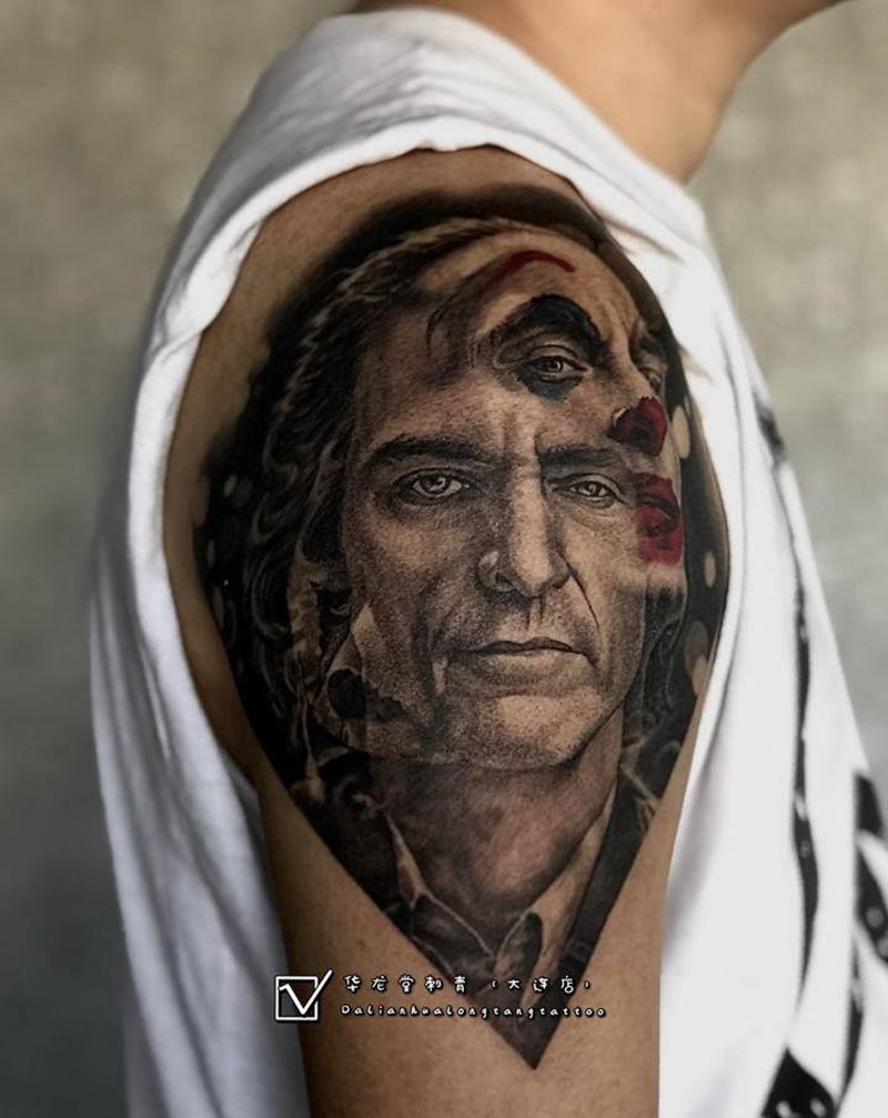 大连华龙堂刺青纹身图片_手臂欧美写实纹身图案