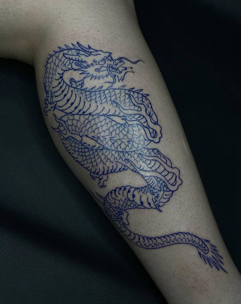 龙纹身的女孩纹身图片_腿部手臂纹身图案