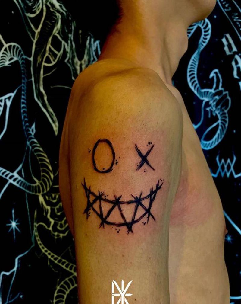 小丑纹身图片_手臂Old School小丑纹身图案