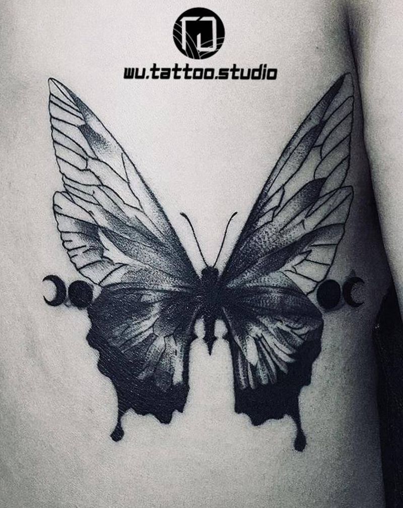 蝴蝶遮盖纹身图片_背部点刺蝴蝶