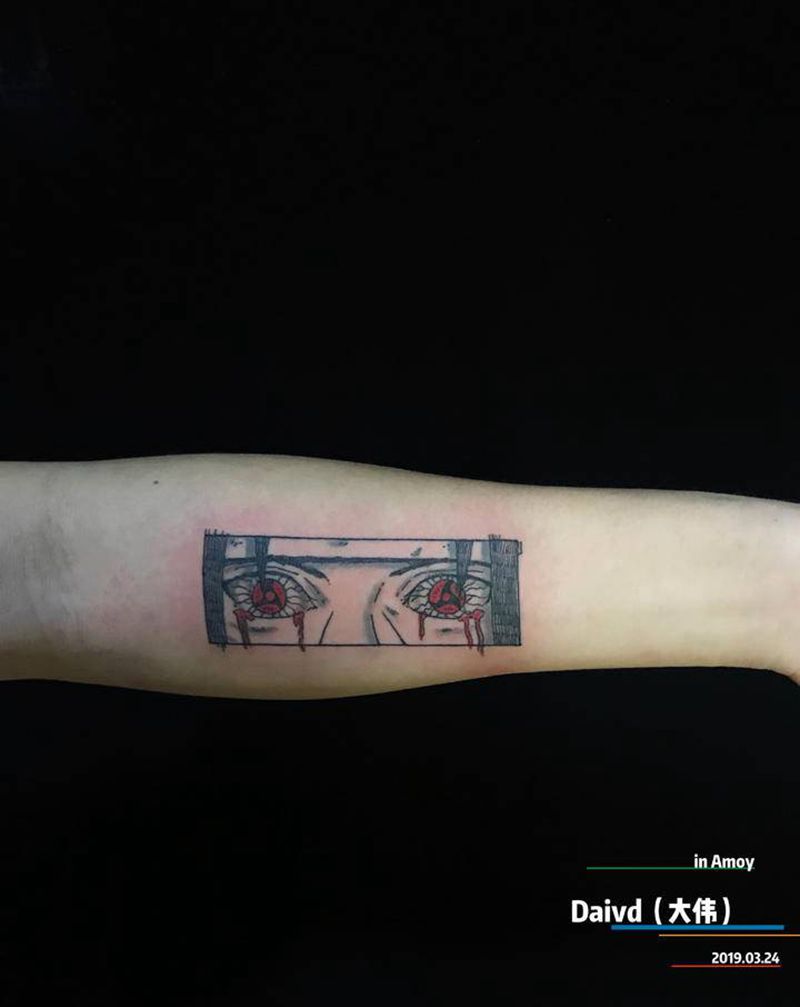 另类写轮眼纹身图片_手臂水彩点刺纹身图案