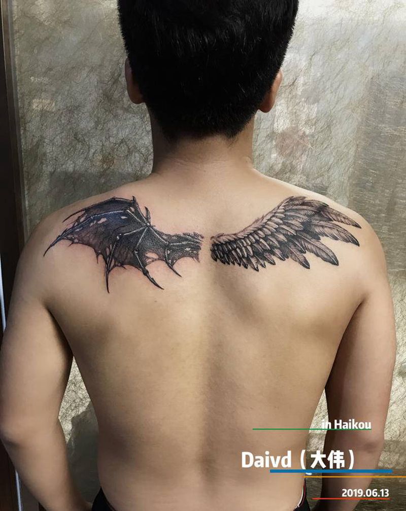 设计天使与恶魔翅膀纹身图片_背部欧美写实纹身图案