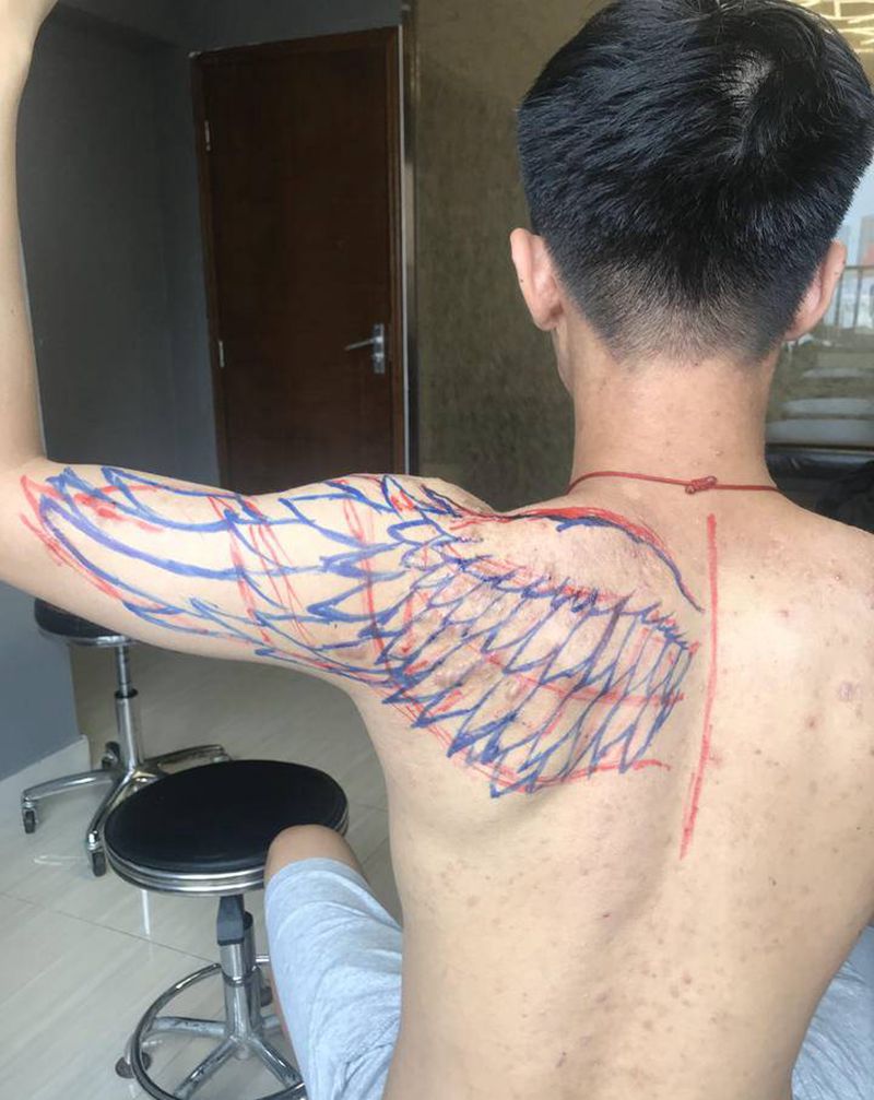 疤痕体质遮盖纹身图片_背部欧美写实纹身图案