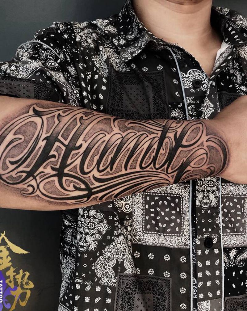 其卡诺花体字纹身图片_手臂花体字图腾纹身图案