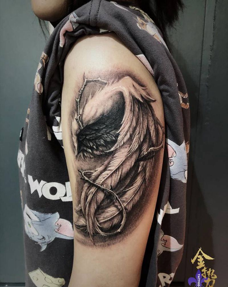 翅膀遮盖纹身图片_手臂肩部欧美写实纹身图案